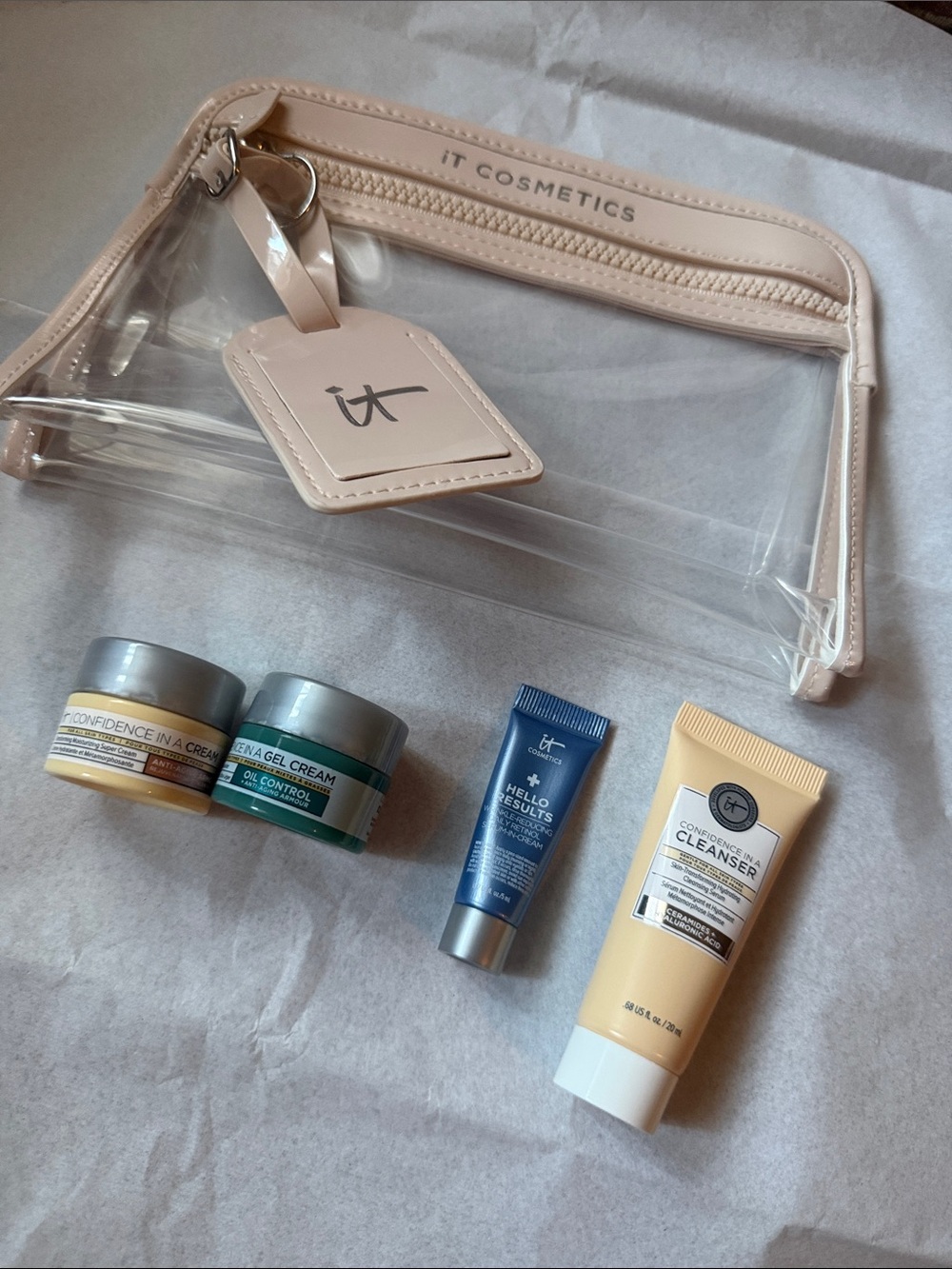 it Cosmetics Blush Clear Travel Bag with Skincare minis. Cleanser, Retinol Serum